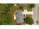 Expansive backyard features a stone patio and an additional seating area, perfect for outdoor entertaining at 285 Finsbury Park Ct, Suwanee, GA 30024