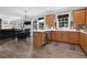 Open kitchen flows into the breakfast nook and living room, creating a connected living space at 285 Finsbury Park Ct, Suwanee, GA 30024