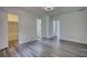 Bedroom showcasing sleek flooring and access to ensuite bath and closet spaces at 2931 Randolph Ct, Conyers, GA 30012