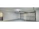 Spacious two car garage with ample lighting, and plenty of room for vehicles at 2931 Randolph Ct, Conyers, GA 30012