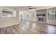 Bright, open floor plan with updated flooring and view of the kitchen at 2931 Randolph Ct, Conyers, GA 30012