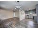 Open living room showcasing modern flooring that connects to the kitchen at 2931 Randolph Ct, Conyers, GA 30012