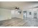 Bright, open floor plan with updated flooring and view of the kitchen at 2931 Randolph Ct, Conyers, GA 30012
