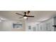 Bright open living space features modern lighting fixtures and view into kitchen at 2931 Randolph Ct, Conyers, GA 30012