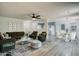 Cozy living room with contemporary furnishings, open to the kitchen and dining areas at 2931 Randolph Ct, Conyers, GA 30012