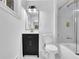 Modern bathroom with a new vanity and a glass shower at 696 Kenilworth Cir, Stone Mountain, GA 30083