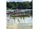 Community shot of children paddling canoe on a summer afternoon at 696 Kenilworth Cir, Stone Mountain, GA 30083