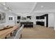 Bright open floor plan with kitchen island connecting the living and dining areas at 696 Kenilworth Cir, Stone Mountain, GA 30083