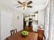 Dining room with hardwood floors and a view into the kitchen at 105 Laney Ct, Mcdonough, GA 30252