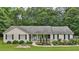 Charming single story home with a lovely front porch and well-maintained landscaping at 105 Laney Ct, Mcdonough, GA 30252