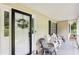 A charming front porch with rocking chairs and a welcoming wreath at 105 Laney Ct, Mcdonough, GA 30252
