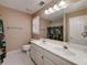 Bathroom featuring double sinks and a large mirror at 170 Glen Eagle Way, Mcdonough, GA 30253