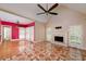 Cozy living room features fireplace, shuttered windows, and unique tile flooring at 170 Glen Eagle Way, Mcdonough, GA 30253