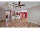 Spacious living room with unique star-patterned tile and vaulted ceiling at 170 Glen Eagle Way, Mcdonough, GA 30253