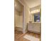 Bathroom featuring a vanity and a view into a separate shower and tub area at 129 Lester Nw Rd, Lawrenceville, GA 30044