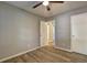 Unfurnished bedroom, showing the closet, light and door to the bathroom at 129 Lester Nw Rd, Lawrenceville, GA 30044
