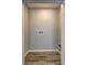 A laundry room showing the hookups for a washer and dryer at 129 Lester Nw Rd, Lawrenceville, GA 30044