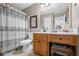 Bathroom featuring a shower-tub combo and vanity at 202 Berkeley Woods Dr, Duluth, GA 30096