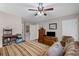 Bedroom with ceiling fan and neutral tones offers a relaxing atmosphere at 202 Berkeley Woods Dr, Duluth, GA 30096