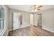 Bedroom with hardwood floors, neutral paint and ensuite bath at 2676 Abington Dr, Snellville, GA 30078