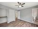 Bedroom with hardwood floors, closet, and neutral paint scheme at 2676 Abington Dr, Snellville, GA 30078