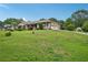 Charming brick home with a well-manicured front yard and attached two car garage at 2676 Abington Dr, Snellville, GA 30078