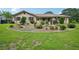 Charming brick home with a well-manicured front yard and inviting curb appeal at 2676 Abington Dr, Snellville, GA 30078