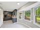 A full kitchen picture shows the gray cabinets, stainless steel appliances, tile backsplash, and the kitchen nook at 2676 Abington Dr, Snellville, GA 30078