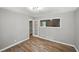 Spacious living area with hardwood floors and ample room for furniture at 2676 Abington Dr, Snellville, GA 30078
