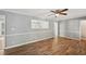 Bright and airy living room featuring hardwood floors and plenty of natural light at 2676 Abington Dr, Snellville, GA 30078
