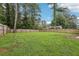 Expansive, well-maintained backyard with a sturdy wooden fence, ideal for privacy and outdoor enjoyment at 3351 Landrum Se Dr, Smyrna, GA 30082
