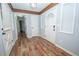 Entryway boasts new flooring and a stylish lighting fixture, creating a welcoming atmosphere at 7505 Rico Rd, Chattahoochee Hills, GA 30268