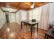 Office space featuring hardwood floors, natural light, a desk, and neutral colored walls at 7505 Rico Rd, Chattahoochee Hills, GA 30268