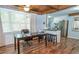 Home office with modern finishes and new flooring with breakfast bar to the kitchen at 7505 Rico Rd, Chattahoochee Hills, GA 30268