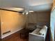 Cozy living room with ceiling fan, hardwood floors and natural light at 1681 Sw Hammond Woods Sw Cir, Marietta, GA 30008