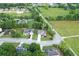 Beautiful aerial view of the home nestled on a well-manicured lot with lush greenery in a serene neighborhood at 327 Oakland Bay Ct, Loganville, GA 30052