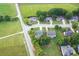 An elevated perspective reveals this home's charming neighborhood setting, complete with mature landscaping and spacious lots at 327 Oakland Bay Ct, Loganville, GA 30052