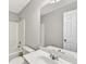 A bathroom featuring a vanity, new paint and a shower/tub at 327 Oakland Bay Ct, Loganville, GA 30052