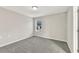This is a bedroom with neutral walls and carpet at 327 Oakland Bay Ct, Loganville, GA 30052