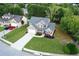 Bird's eye view of this gorgeous two story home with a two-car garage, with great lawn and curb appeal at 327 Oakland Bay Ct, Loganville, GA 30052