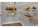 Organized pantry with metal shelving perfect for storing food items and kitchen essentials at 53 Colonial Ter, Villa Rica, GA 30180