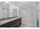 Stylish bathroom with a double vanity, a tub, and a walk-in shower at 1100 Howell Mill Nw Rd # 212, Atlanta, GA 30318