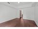Spacious bedroom with hardwood floors and an ensuite bathroom at 1100 Howell Mill Nw Rd # 212, Atlanta, GA 30318
