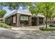 Charming storefront with wood and large windows offers a welcoming entrance within a landscaped surrounding at 1100 Howell Mill Nw Rd # 212, Atlanta, GA 30318