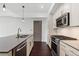 Well-designed kitchen with a center island, stainless steel appliances, and modern finishes at 1100 Howell Mill Nw Rd # 212, Atlanta, GA 30318