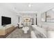 Bright, open-concept living room with a modern kitchen and stylish furnishings at 1100 Howell Mill Nw Rd # 212, Atlanta, GA 30318