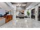 Elegant building lobby featuring tile floors, a reception desk, seating area, and elevator access at 1100 Howell Mill Nw Rd # 212, Atlanta, GA 30318