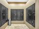 Secure mailroom featuring multiple mailboxes, ensuring safe and convenient mail delivery at 1100 Howell Mill Nw Rd # 212, Atlanta, GA 30318