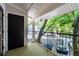 The home's outdoor balcony features views of lush trees, providing a serene retreat at 1150 Collier Nw Rd # 6H, Atlanta, GA 30318