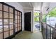 The unit's balcony features views of lush trees providing a serene outdoor space at 1150 Collier Nw Rd # 6H, Atlanta, GA 30318